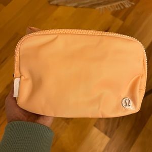 NWT Lululemon Everywhere Belt Bag SUMG light orange color